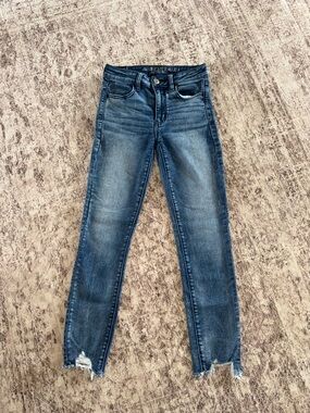 American Eagle Outfitters Medium Blue Raw-Hem Skinny Jeans